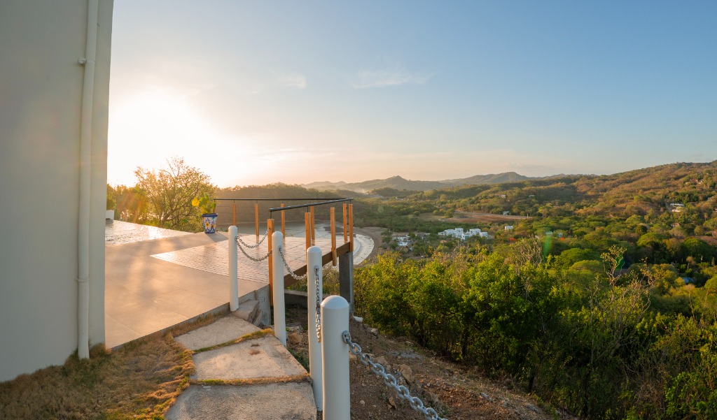 Lookout platform over Nacascolo Bay in late afternoon sunlight